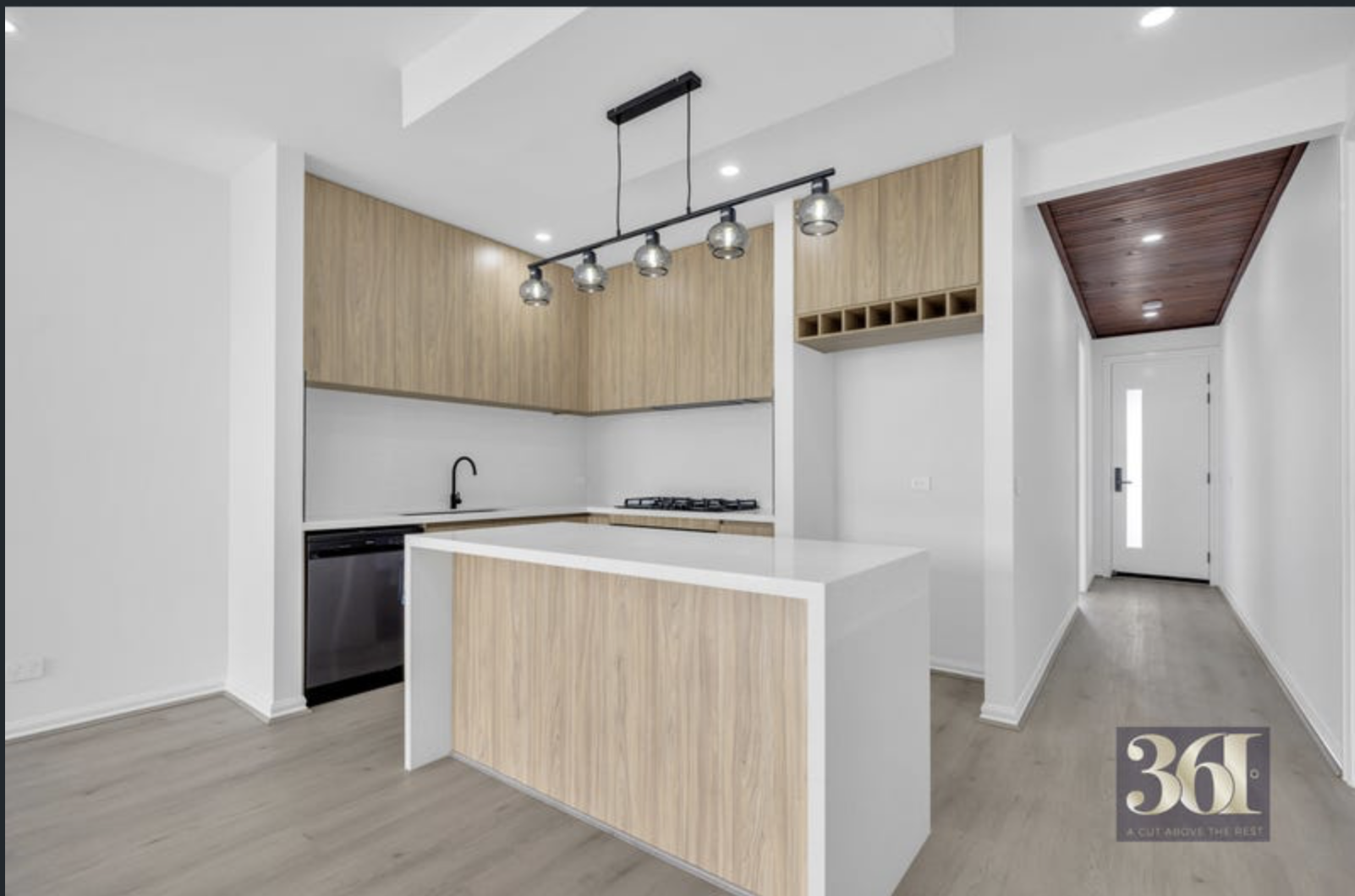 Kitchen with island and timber cabinetry